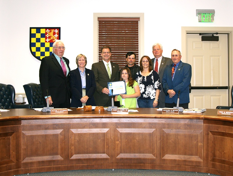 McKenzie Betts received a Jefferson Award for Public Service. Shown are (l-r) Lewes City Councilman Victor Letonoff, Councilwoman Bonnie Osler, Mayor Jim Ford, McKenzie, Bobbie and Dianne Betts, and councilmen Ted Becker and Fred Beaufait. BY HENRY J. EVANS JR.
